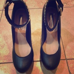 Size 6 black pumps w/ gold detail on ankle strap